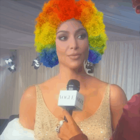 Woman with Rainbow Wig Being Interviewed