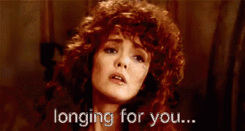 Woman With Red Curly Hair Longing for You