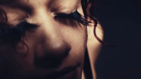 Woman With Red Eyes Close Shot GIF