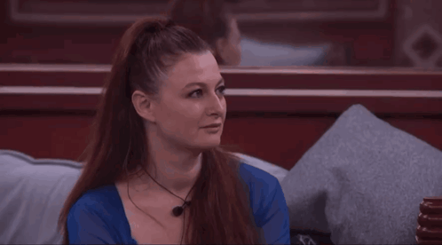 Woman With Red Hair And Blue Shirt Smiling GIF