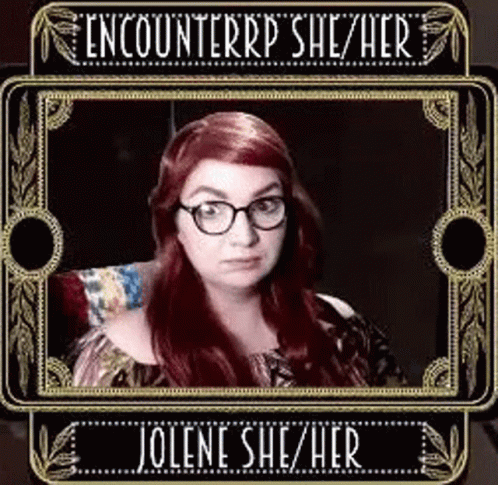Woman With Red Hair and Glasses in Frame