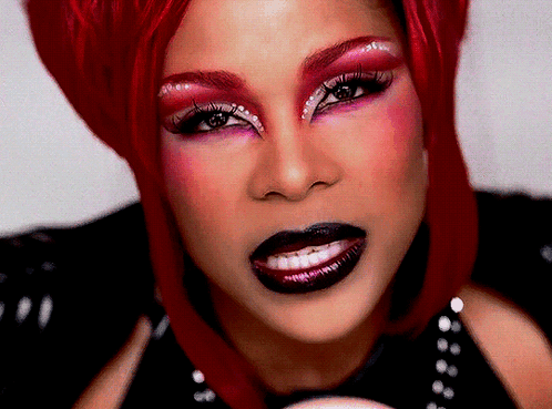 Woman With Red Hair and Makeup Close Up