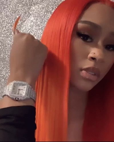 Woman with Red Hair and Silver Watch