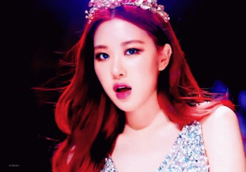 Woman with Red Hair and Tiara