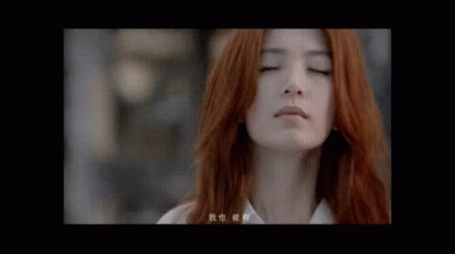 Woman With Red Hair Close Up
