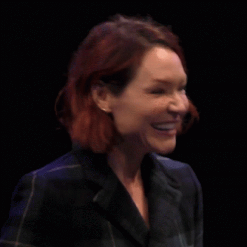 Woman with Red Hair Crosses Fingers