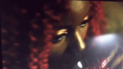 Woman With Red Hair Drinking From Glass GIF