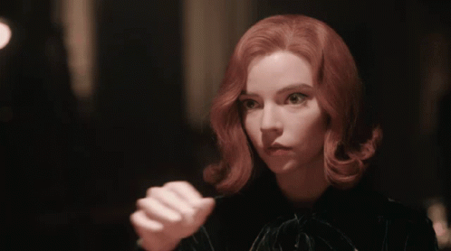 Woman With Red Hair Hands Folded GIF