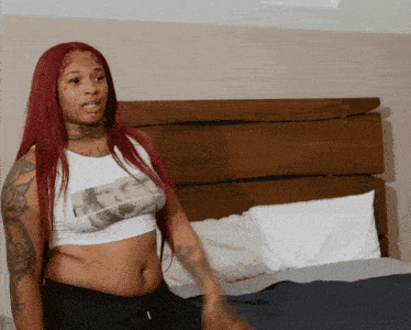 Woman With Red Hair In Crop Top Saying TS GIF