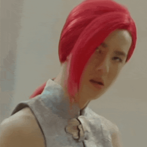 Woman With Red Hair In Glasses And Blue Shirt GIF