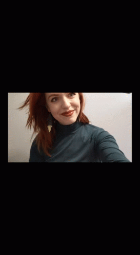 Woman with Red Hair in Turtleneck
