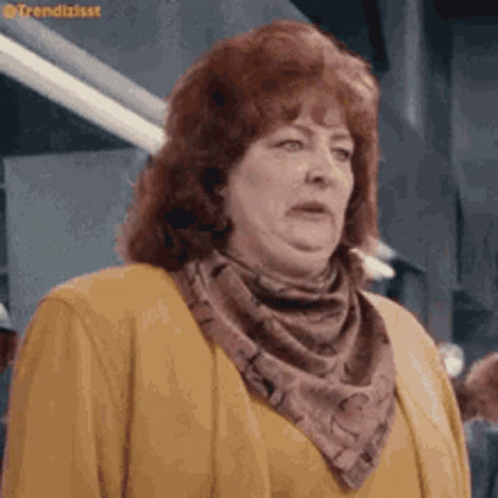 Woman With Red Hair in Yellow Sweater and Scarf