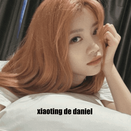 Woman With Red Hair Laying On Bed With Xiaoting De Daniel GIF