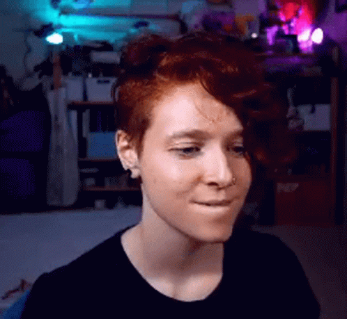 Woman with Red Hair Making Face