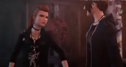 Woman With Red Hair Next to Man in Video Game