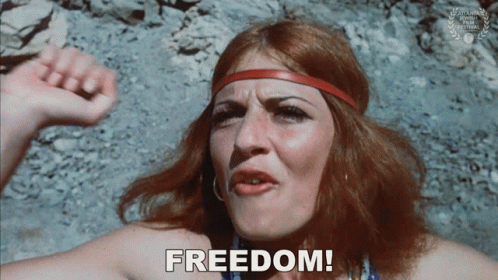 Woman With Red Hair Saying Freedom