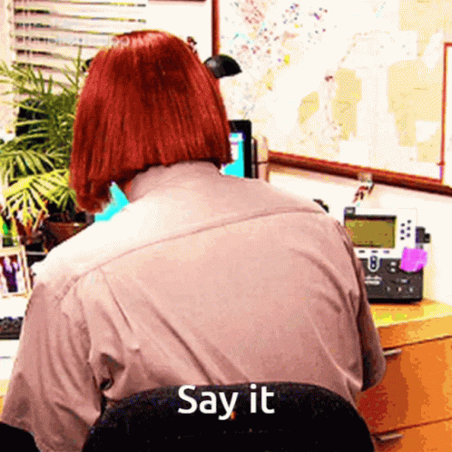 Woman with Red Hair Saying Say It