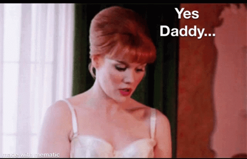Woman with Red Hair Saying Yes Daddy