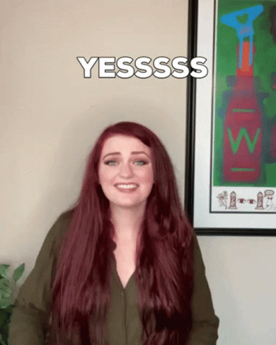 Woman with Red Hair Saying Yesssss