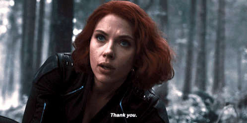 Woman With Red Hair Says Thank You in Woods