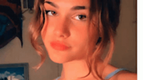 Woman with Red Lips and Blue Tank Top