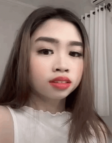 Woman with Red Lipstick and White Shirt