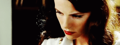 Woman with Red Lipstick Looking Down