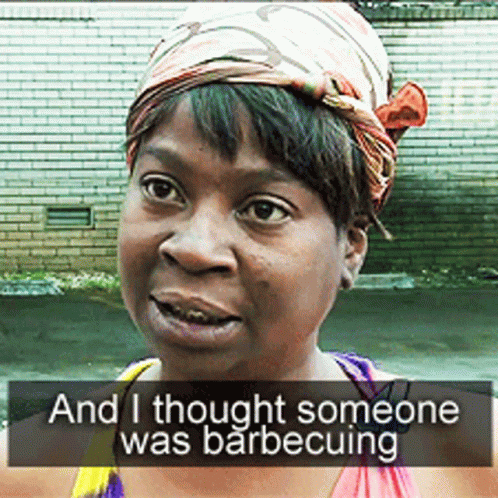 Woman with Scarf Saying I Thought Someone Was Barbecuing