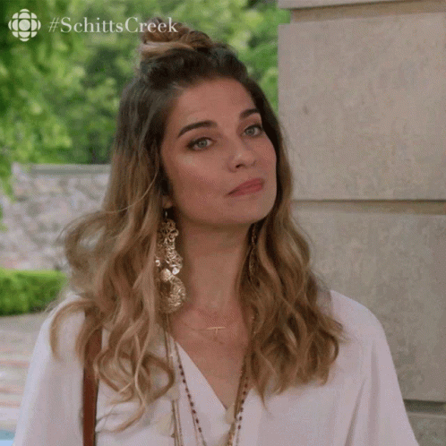 Woman With #Schitt's Creek Shirt GIF