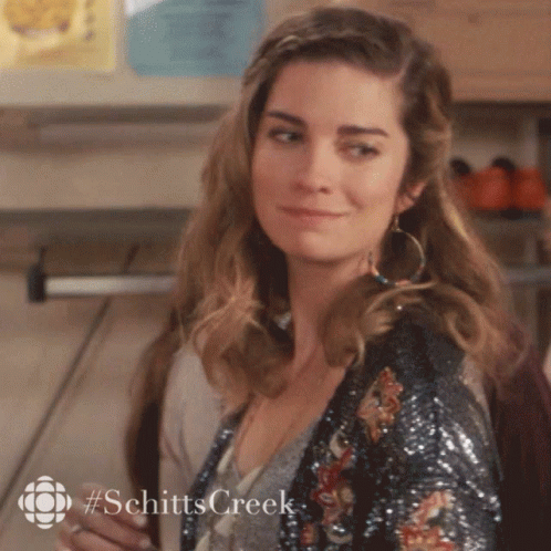 Woman With Schitt's Creek Shirt GIF