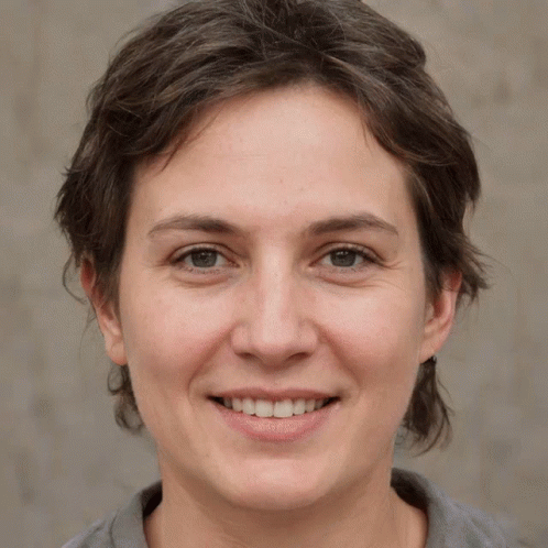 Woman With Short Brown Hair Smiling GIF