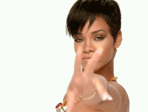 Woman With Short Hair And Necklace Pointing At Camera GIF