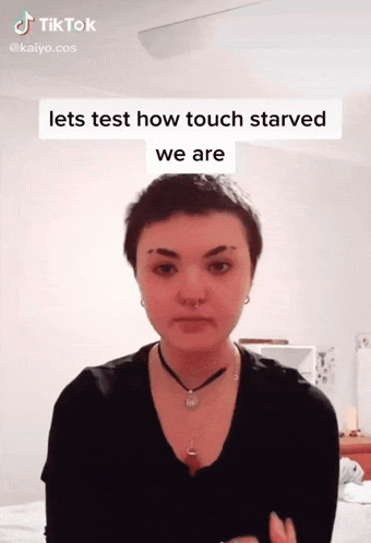 Woman with Short Hair Saying Lets Test How Touch Starved We Are