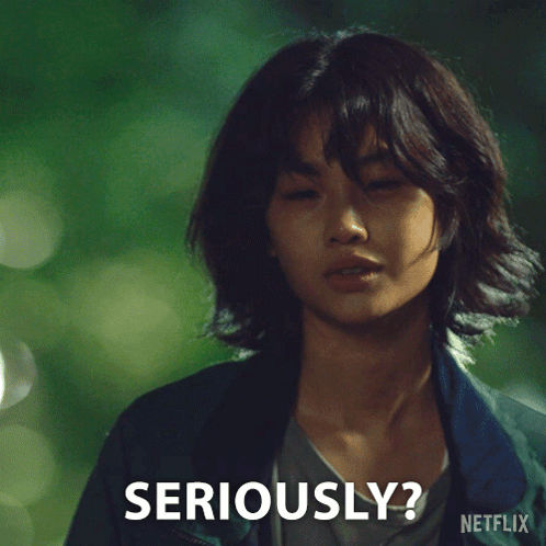 Woman with Short Hair Says Seriously
