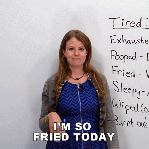 Woman With Sign Saying Tired Exhausted Pooped Fried Sleepy Wiped Burnt Out