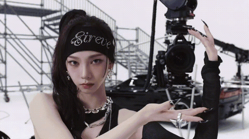 Woman With Sireve Headband Facing Camera