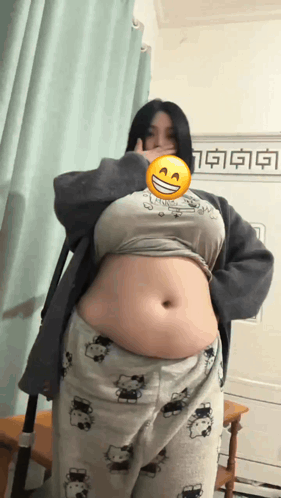 Woman With Smiley Face Showing Belly