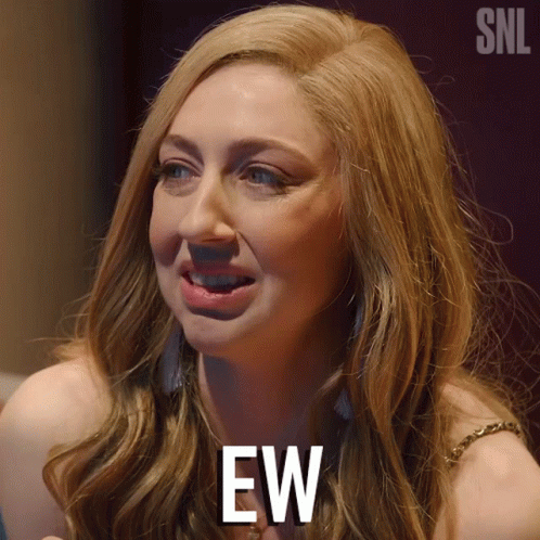 Woman with SNL Logo Behind