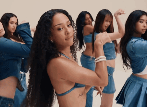 Woman With Stomach Tattoo In Front Of Girls GIF