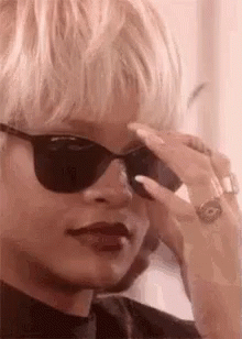 Woman With Sunglasses And Ring GIF