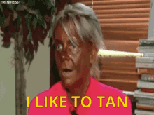 Woman With Tan Saying I Like to Tan