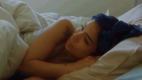 Woman with Tattoo Sleeping