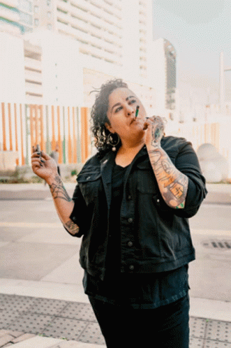 Woman With Tattoos Smoking