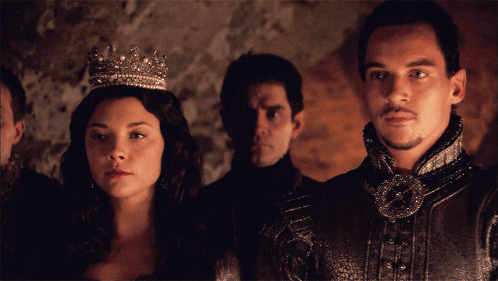 Woman With Tiara Next to Man