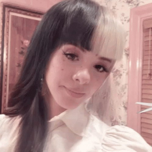 Woman With Two Different Colored Hair Taking Selfie