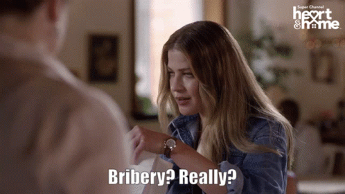 Woman with Watch Says Bribery Really Super Channel