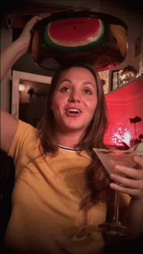 Woman With Watermelon Head Holding Martini GIF