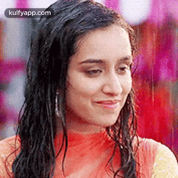 Woman with Wet Hair Smiling in Rain