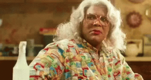 Woman With White Hair, Glasses, And Water Bottle GIF