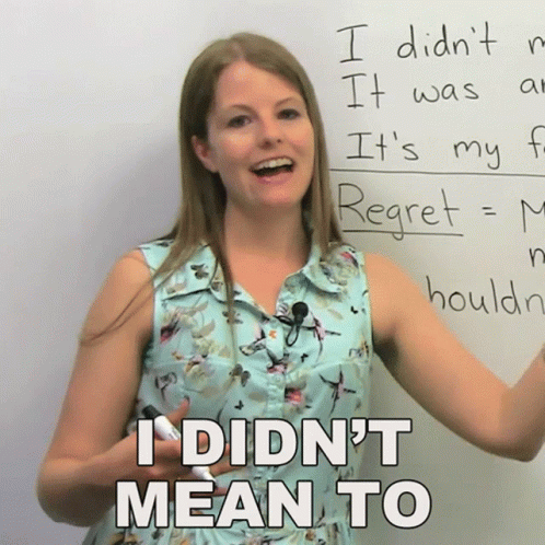 Woman With Whiteboard Saying I Didn't Mean To